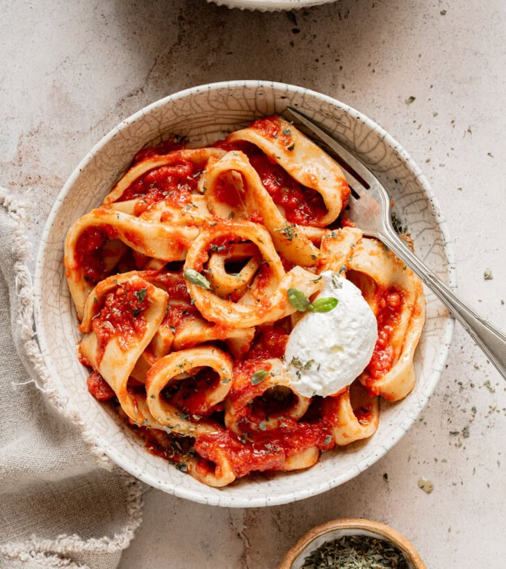 Cooked high-protein pasta noodles served in a bowl with sauce
