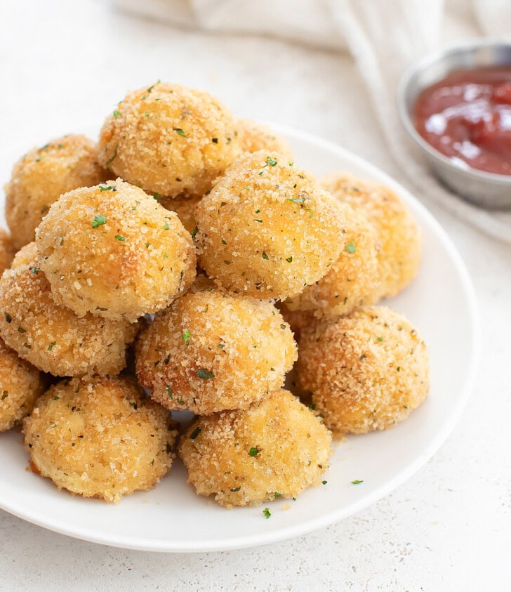 Golden brown Cottage Cheese Balls on a plate