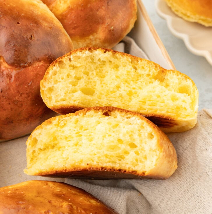 A bread roll cut in half