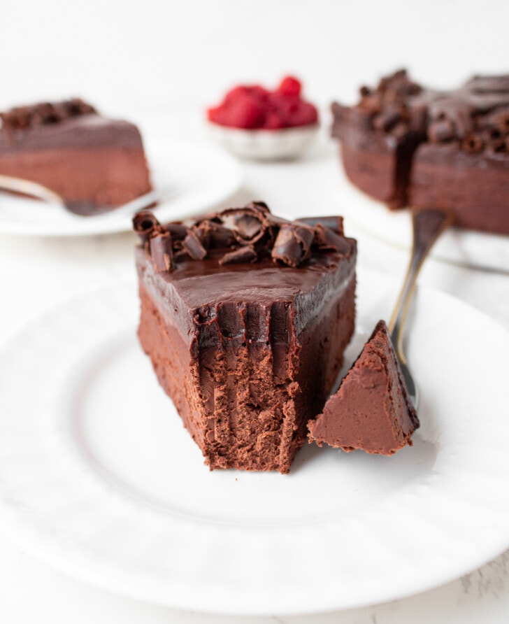 A bite taken from a slice of No Bake Chocolate Cake