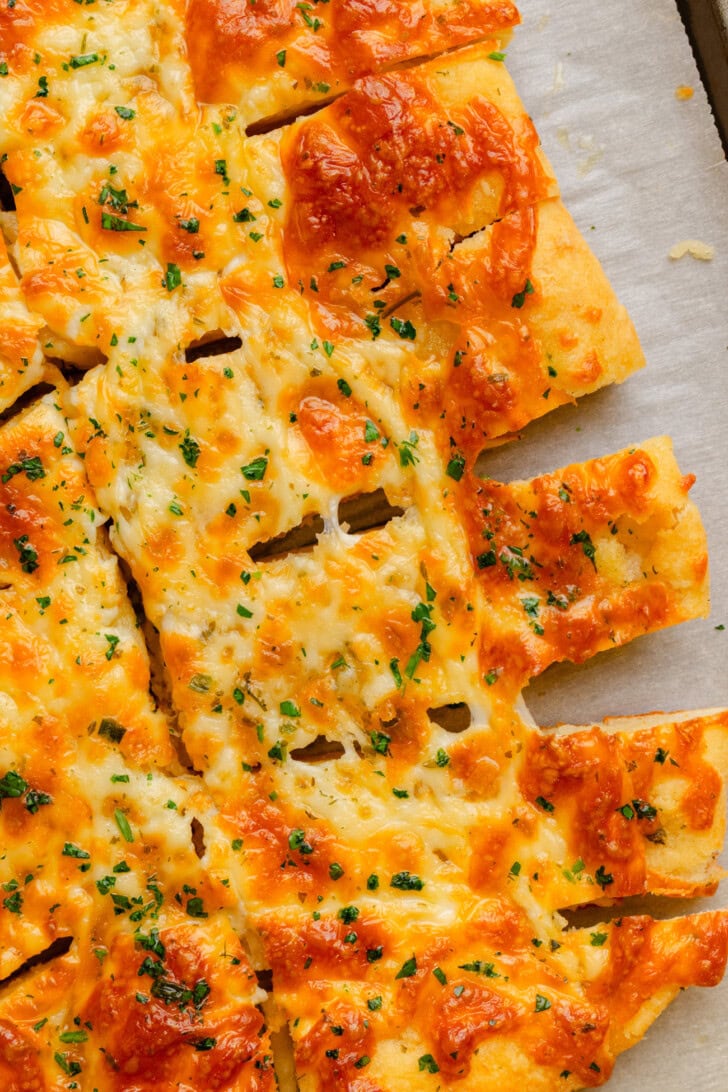 Cottage Cheese Breadsticks with finely chopped parsley on top