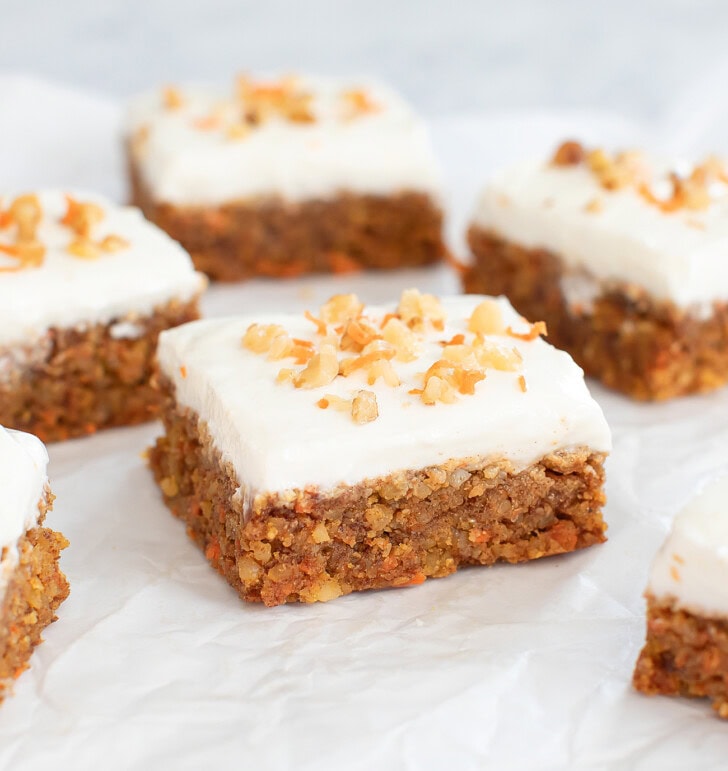 No Bake Carrot Cake Bars cut into squares with a frosting