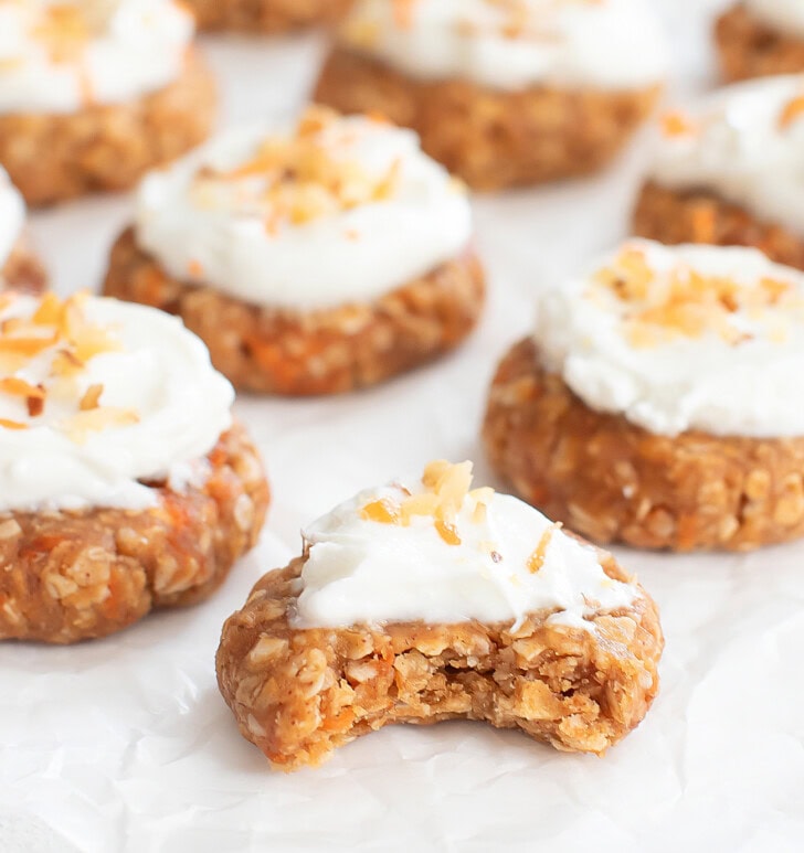 A Carrot Oatmeal Cookie with a bite taken from it