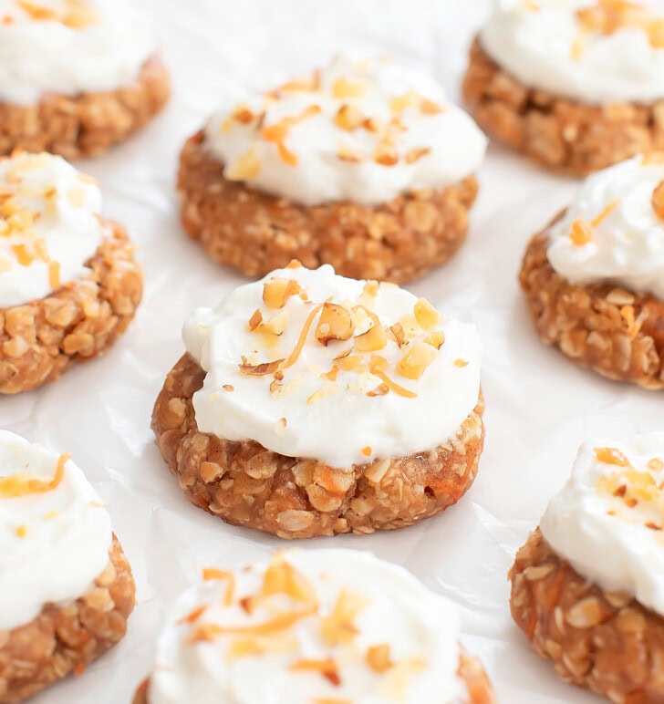 Carrot Oatmeal Cookies with frosting and chopped nuts on top