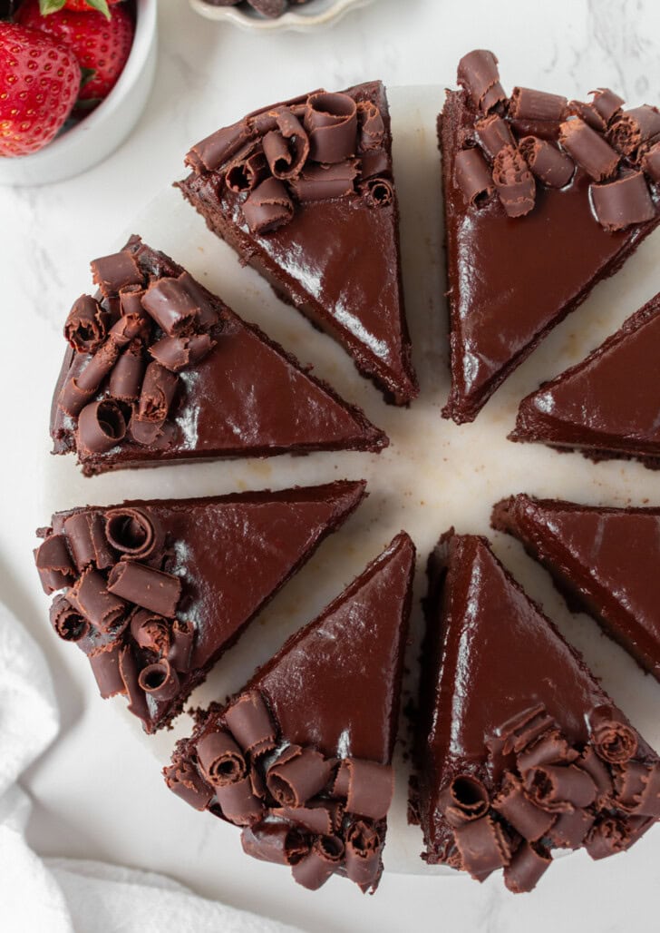 Chocolate cake slices with chocolate frosting and chocolate curls