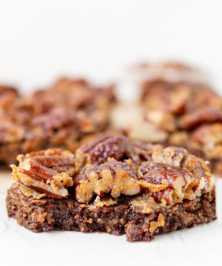 A close up of a pecan pie bar