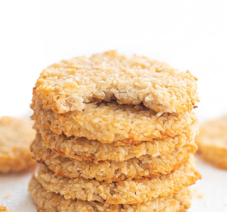 A bite taken from a coconut cookie