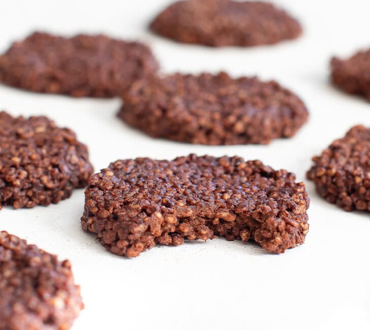 A bite taken from a chocolate cookie