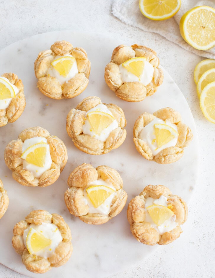 Lemon Yogurt Cheesecake Bites with fresh lemon slices on top