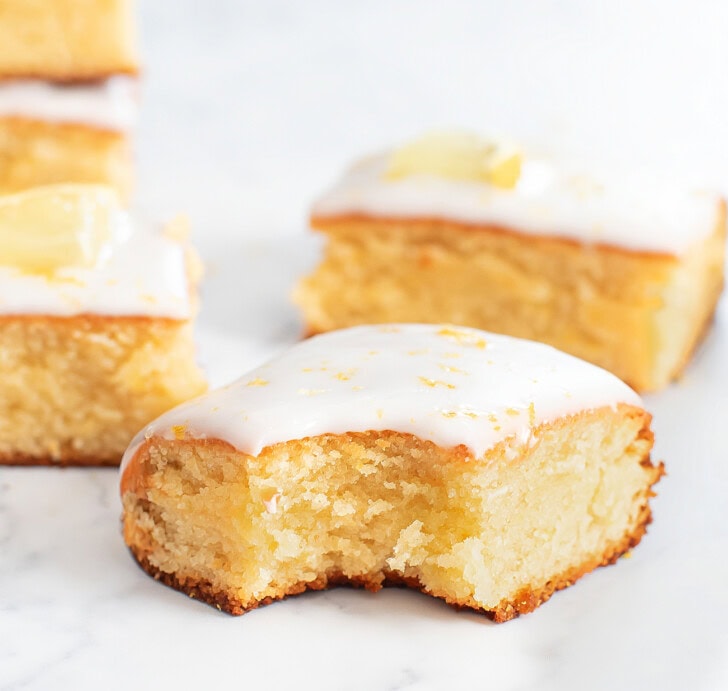 A bite taken from a lemon brownie