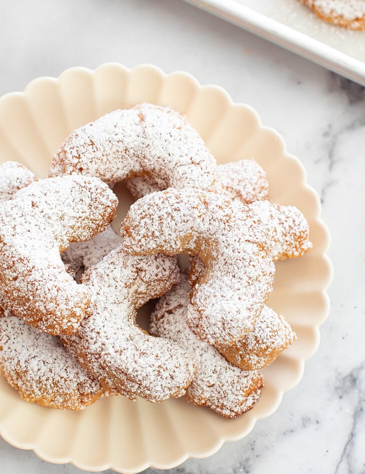 Crescent cookies on a scalloped plate