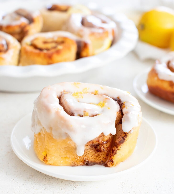 A lemon cinnamon roll on a plate