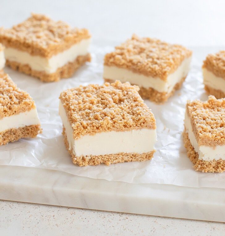 Cheesecake bars on a serving board