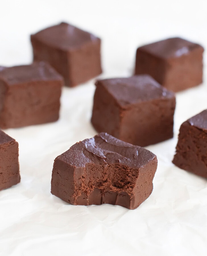 A bite taken from a piece of chocolate fudge