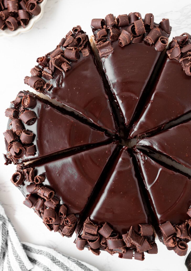 A chocolate cake cut into eight slices