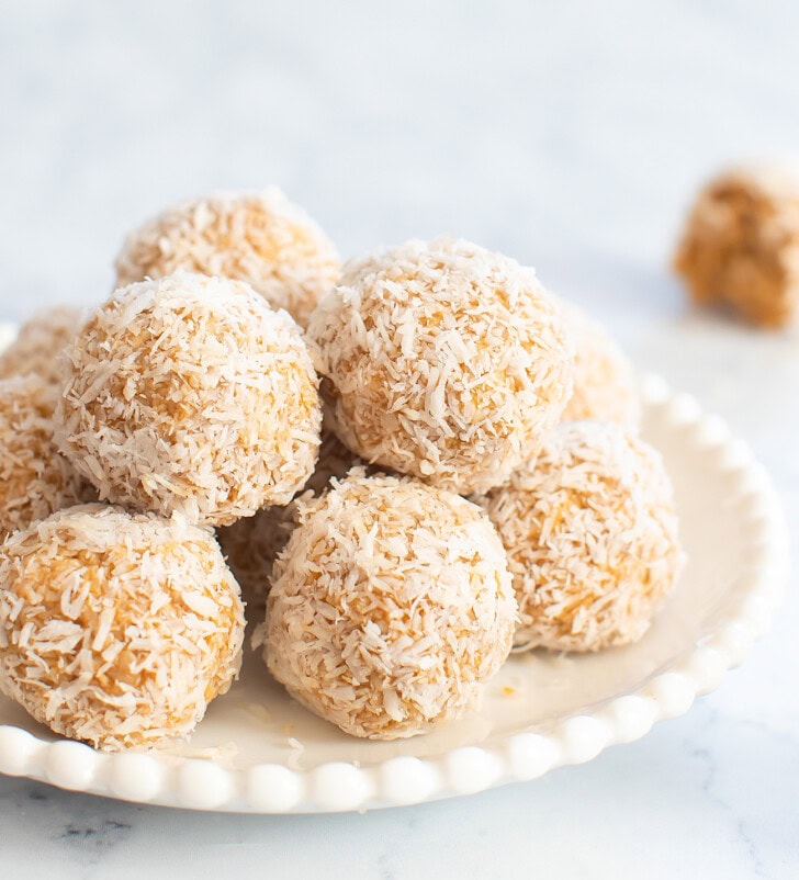 Mango coconut balls on a plate