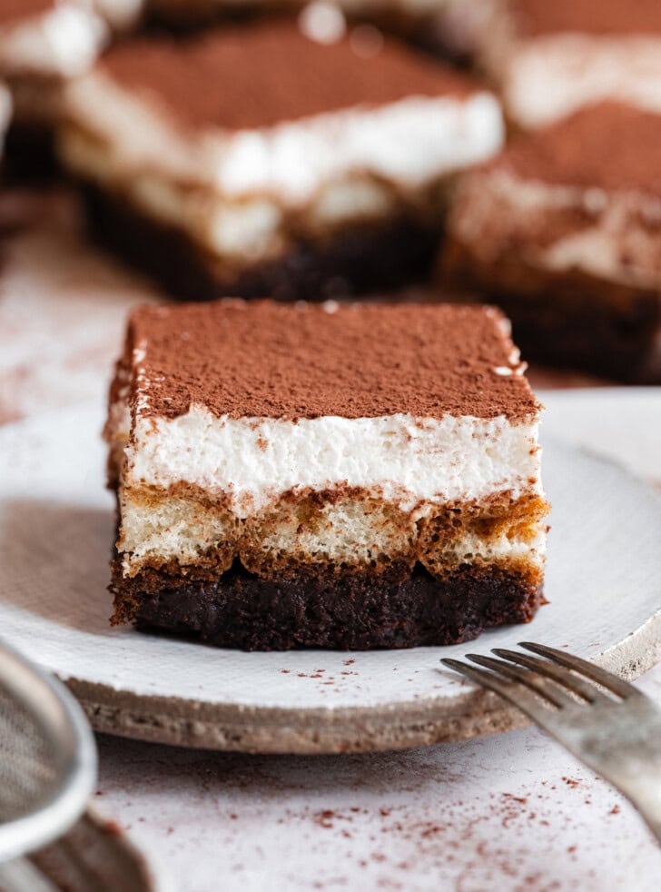 A Tiramisu Brownie on a plate with a fork