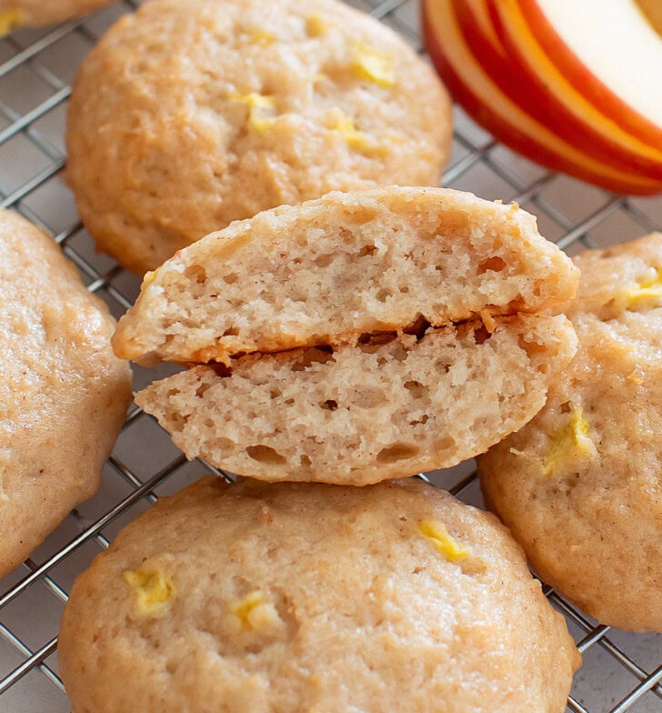 An apple cookie cut in half showing the middle