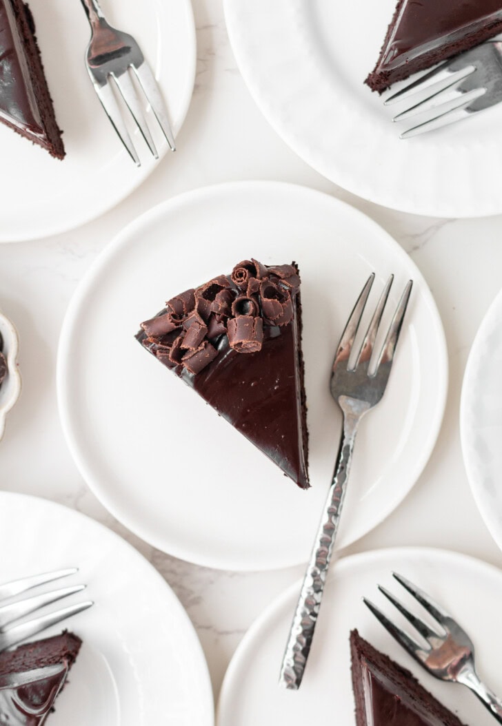 The top view of a slice of chocolate cake with chocolate ganache frosting