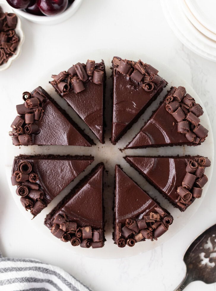 A chocolate cake cut into eight slices