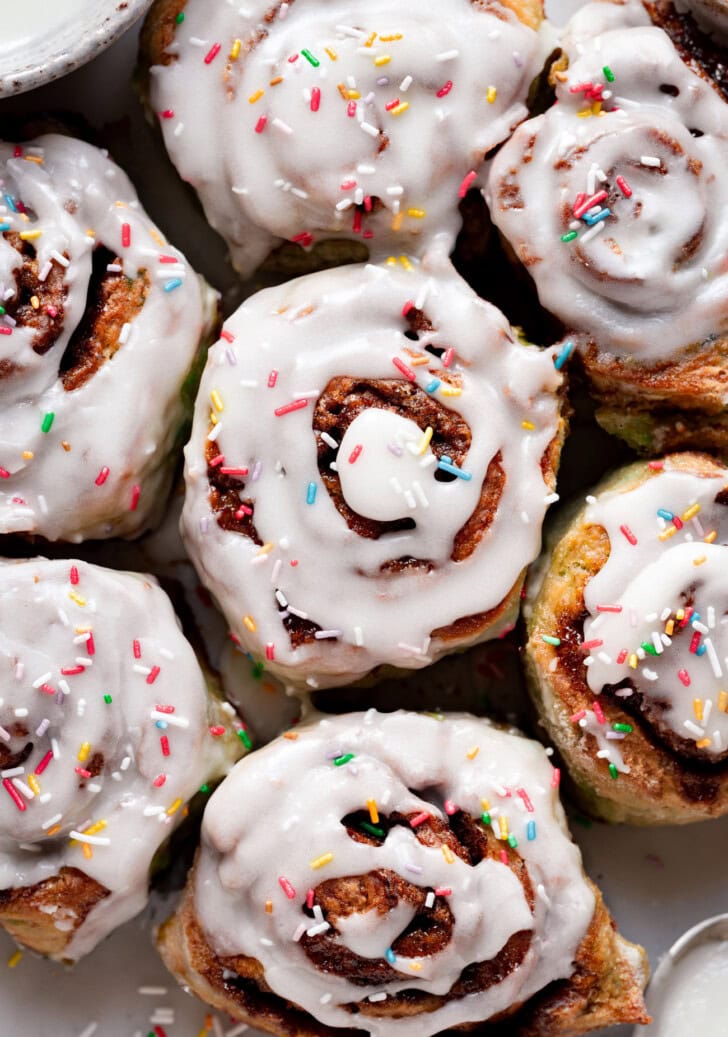 Cinnamon rolls with icing and jimmies on top
