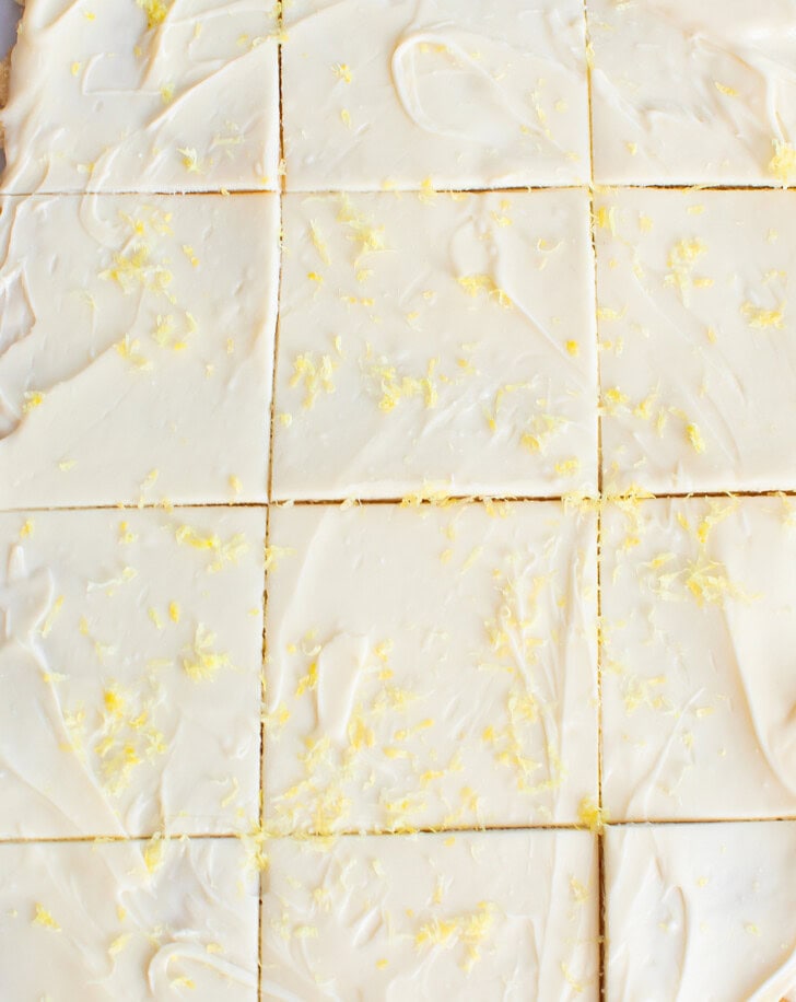 Cake bark cut into squares with lemon zest on top