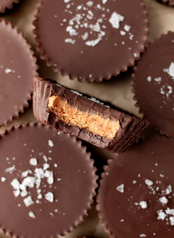 A bite taken out of a chocolate peanut butter cup